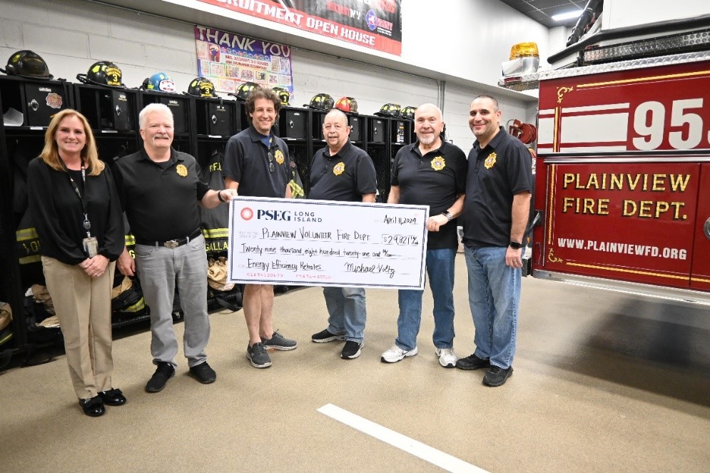Pictured from left to right are: Stacey Wagner of PSEG Long Island and members of the Plainview Volunteer Fire Department board of directors: Rich Tousey, Eric Slavsky, Michael Michitsch, Gerard Petti and Spencer Adelberg.