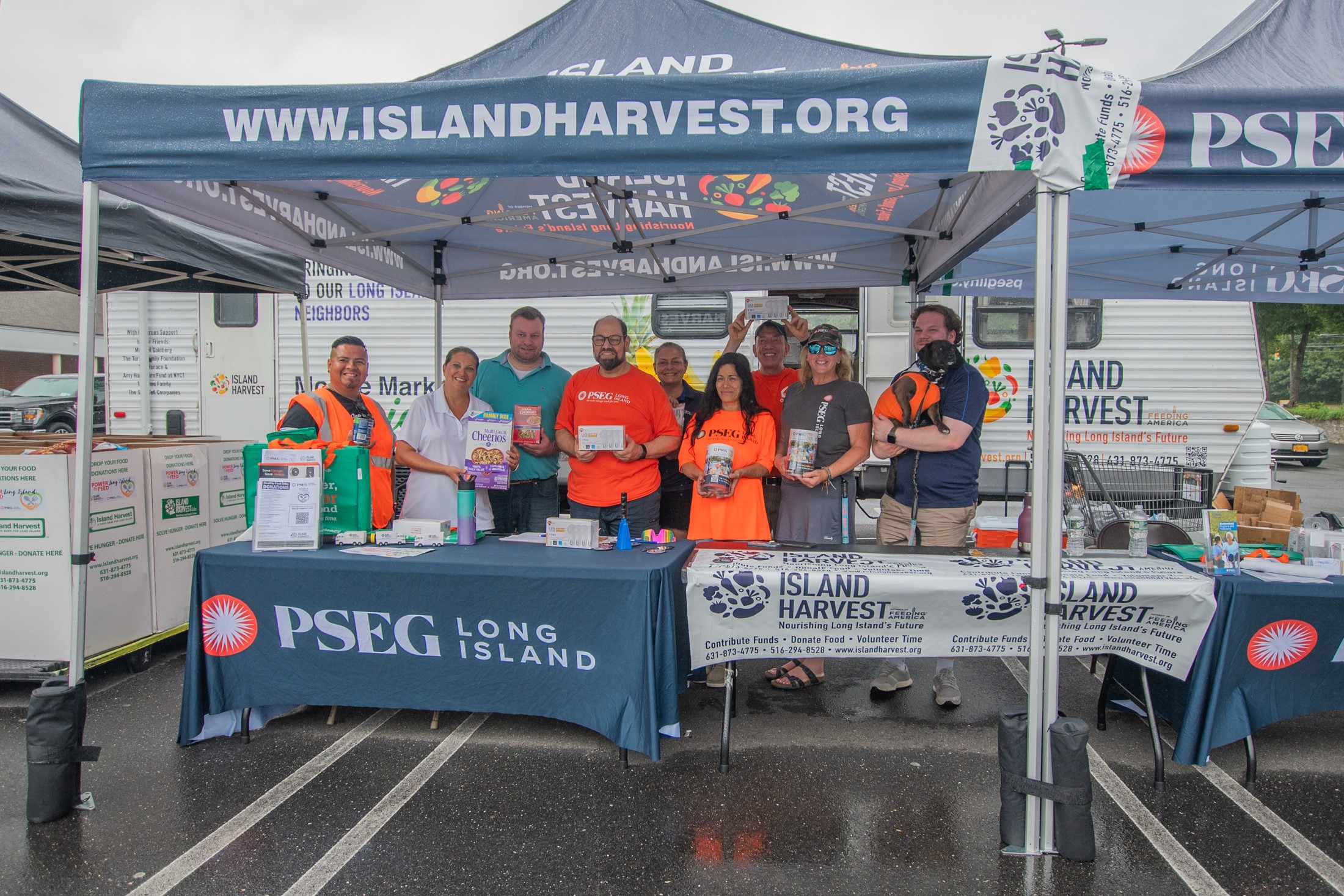 New York State Assemblyman Ed Flood (third from left) with PSEG Long Island employee-volunteers and Island Harvest at PSEG Long Island’s Power to Feed Long Island collection drive in South Setauket on Friday, July 12.